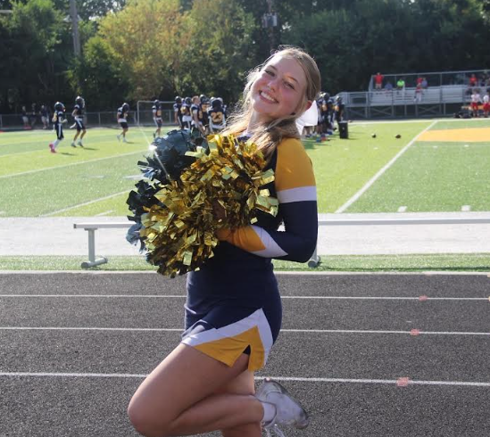Lila ready to cheer at the Freshman Football game. Photo Credit: Isabella Guy