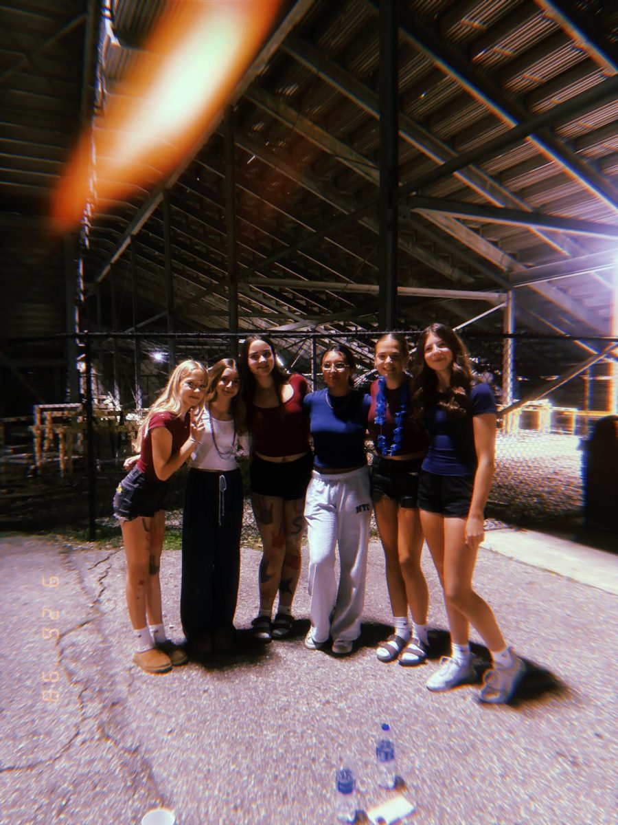 Kate and some of her friends at a CHS football game.