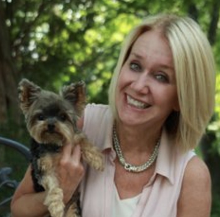 Screenshot of Pam Ford Morgan with her dog. 